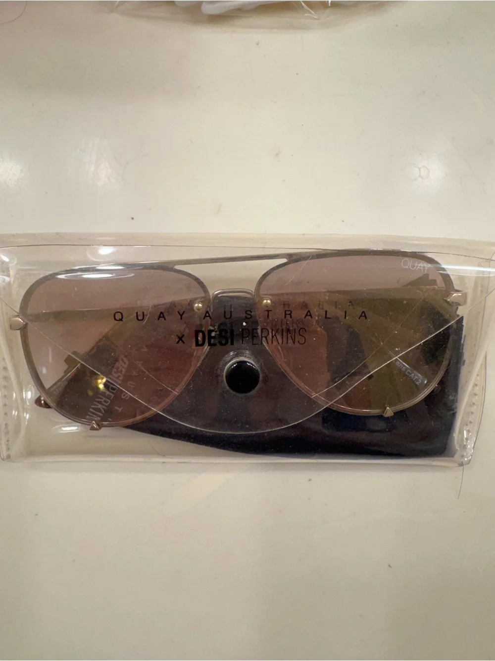 Quay Australia x Desi Perkins High Key Rimless Sunglasses